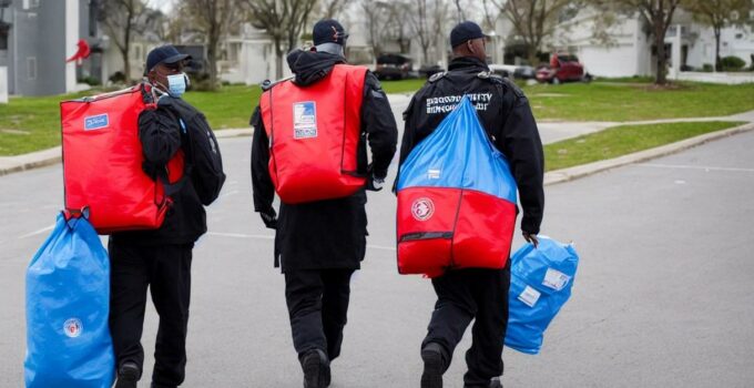 A Person Carrying A Large Bag Of Emergency Preparedness Supplies.